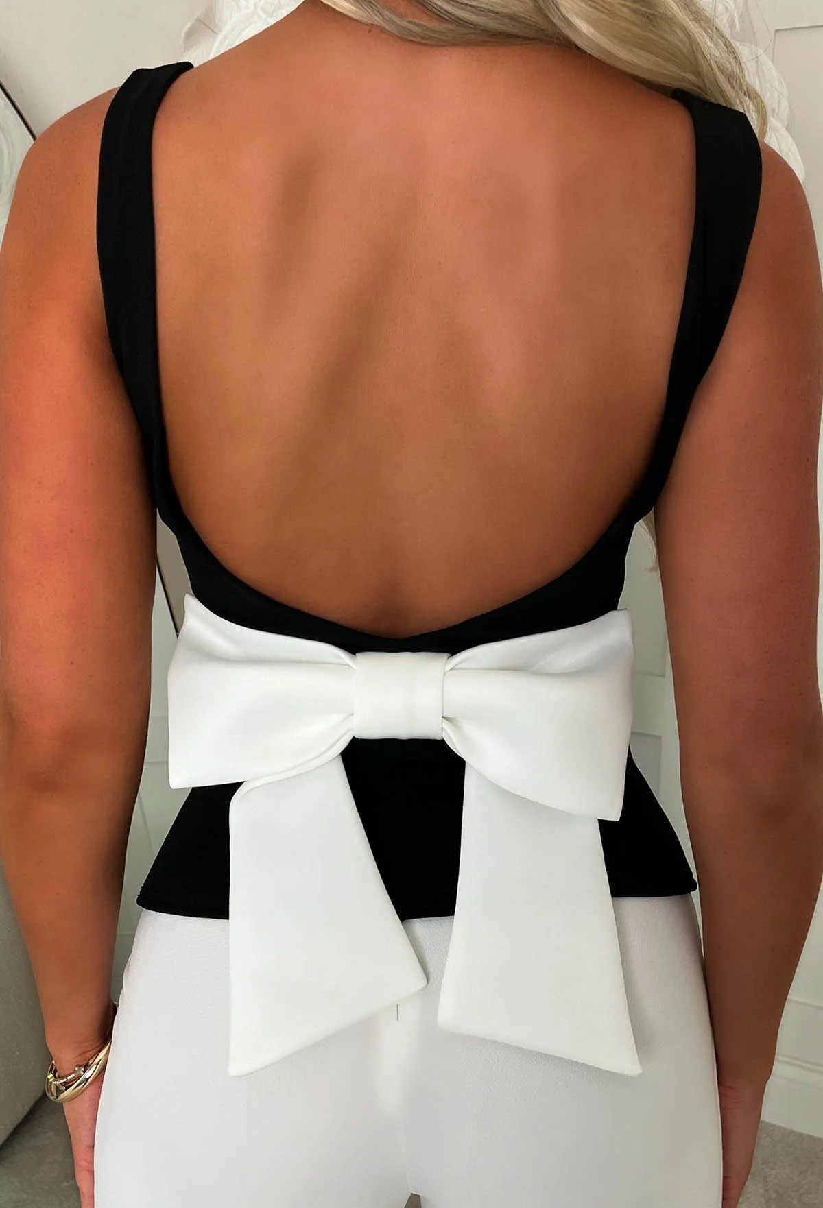 Bow Belle Black Bow Back Peplum Top - Image 2