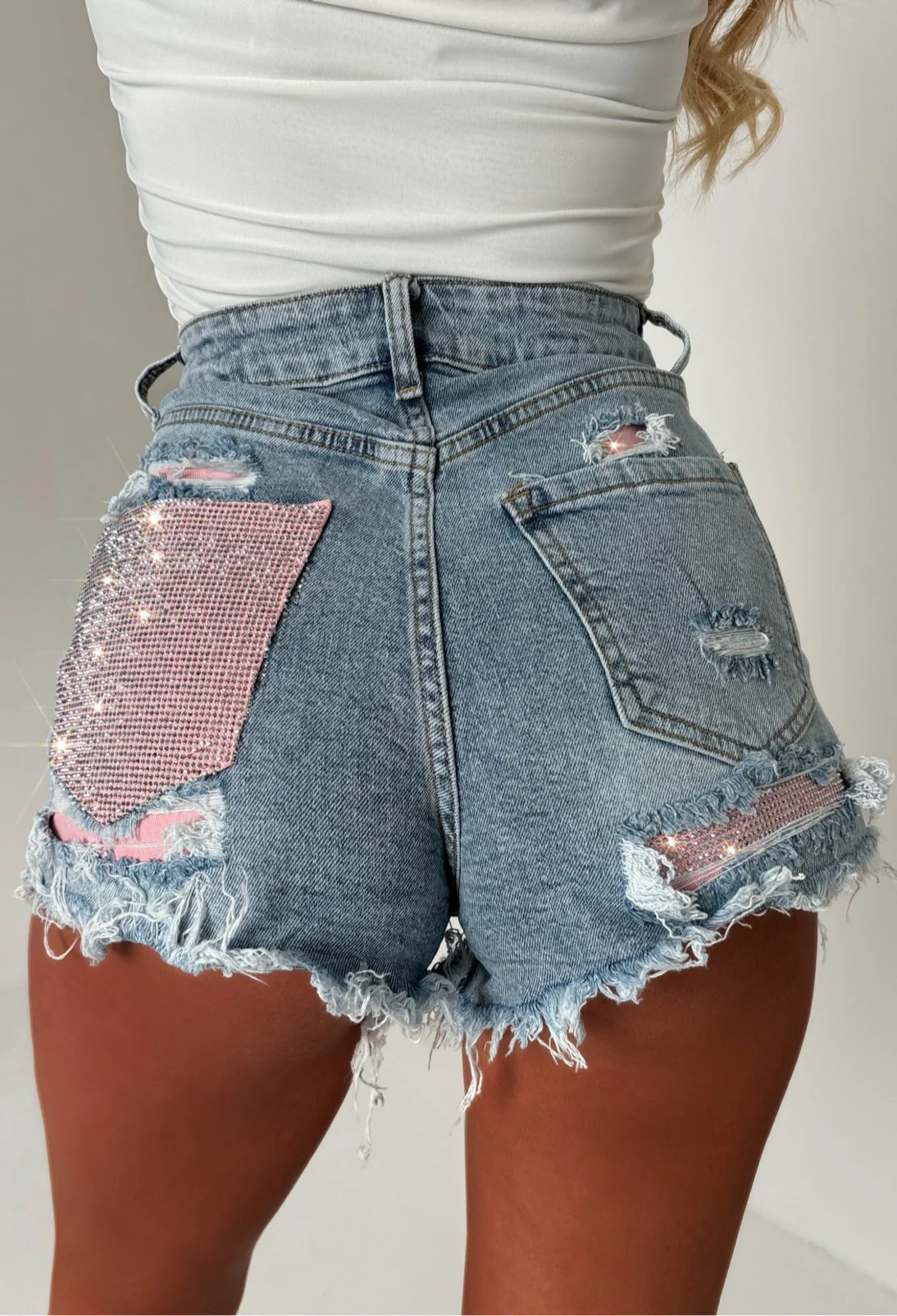 Bring On The Drama Mid Wash Ripped Denim Hot Fix Pink Pocket Shorts - Image 5