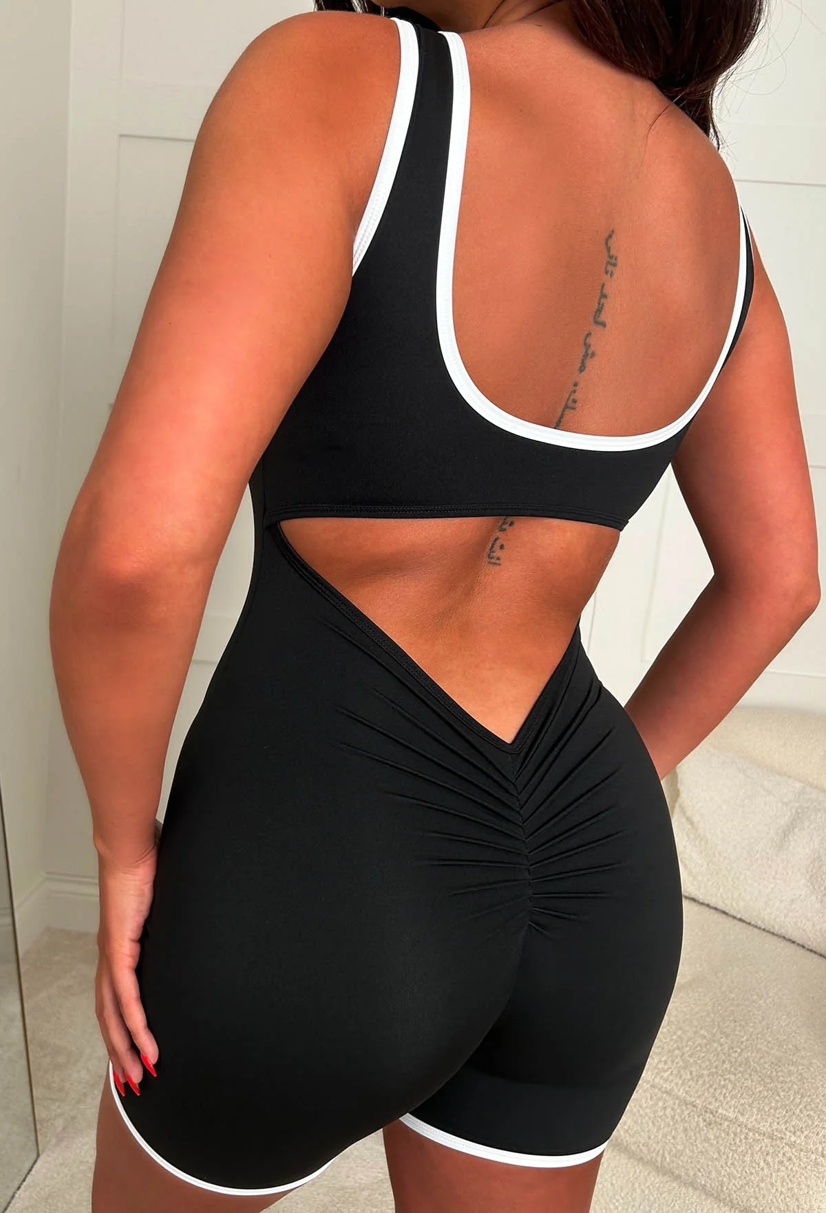 Effortless Style Black Contrast Edge Ruched Unitard - Image 4